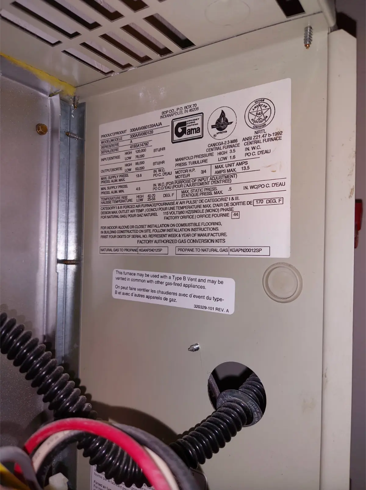 Nameplate of the roughly 30-year-old gas furnace